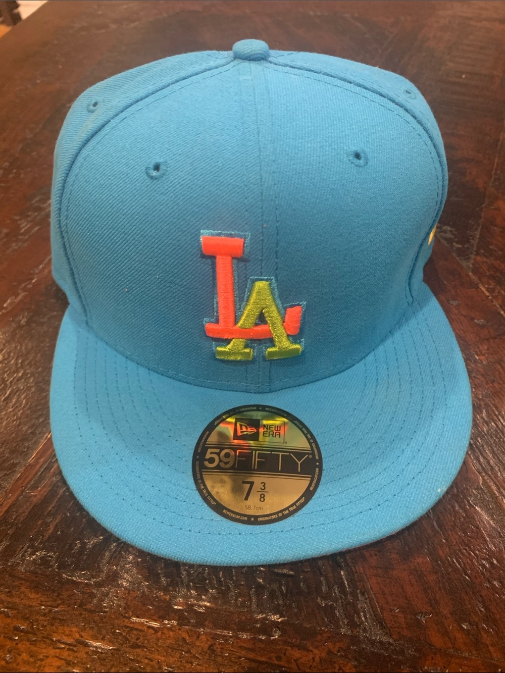 New Era Teal LA Fitted Hat with Neon Orange and Neon Yellow Accent